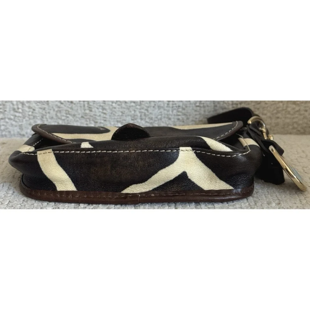 Dooney & Bourke Giraffe Print Haircalf Leather Flap Wristlet Bag Blue Logo Charm